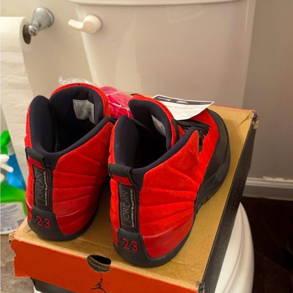 Jordan 12” reverse flu game “.    Worn once